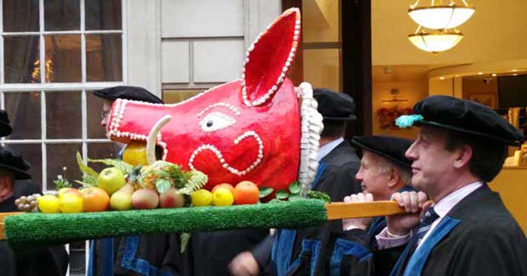 Carrying the Boar's Head at the annual ceremony.