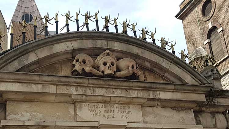 The stone skulls outside St Olave's Church.