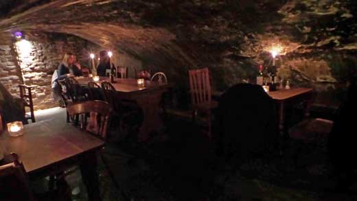 The candlelit cellar of Gordon's Wine Bar.
