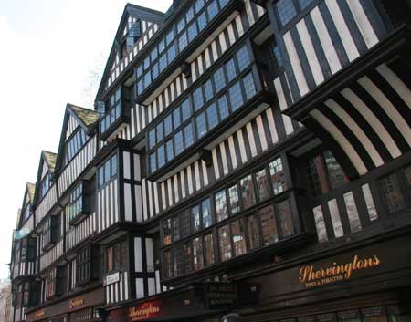 The black and white timbered front of Staple Inn.