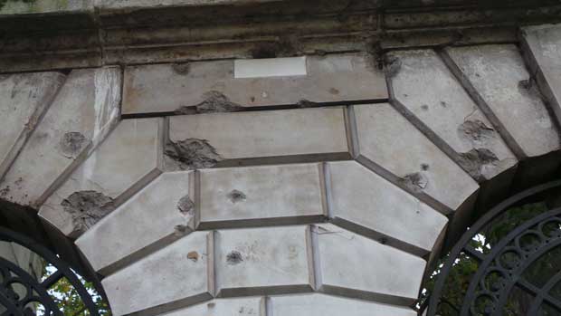 Shrapnel damage on the wall of St Bartholomew's Hospital.