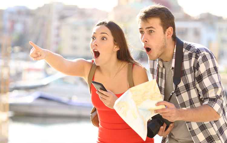 A couple looking surprised at something they can see.