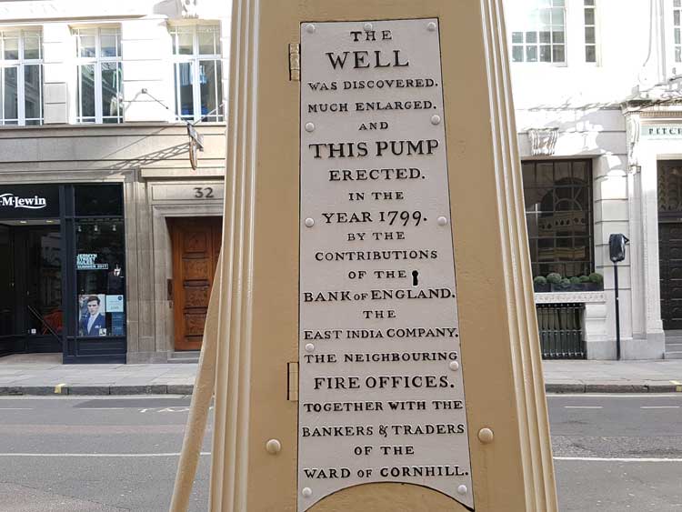 The inscription on the pavement side detailing how the Cornhill pump was constructed.