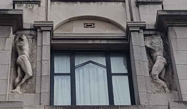 Two of the Epstein statues on Zimbabwe House.