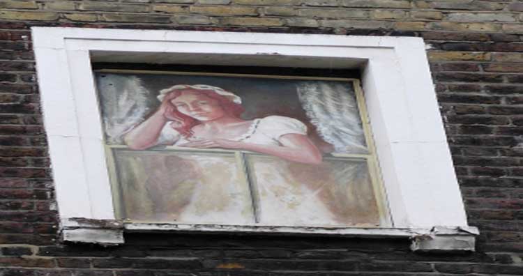 The girl in the white nightdress who looks down from the upper storey of the Newman Arms.