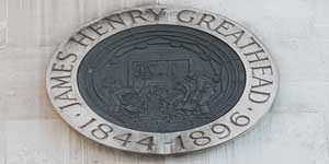 The plaque on the pedestal of the James Henry Greathead statue, Cornhill.
