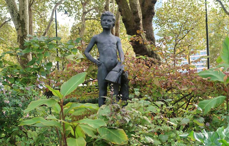 The statue of a boy in Inner Temple Garden.