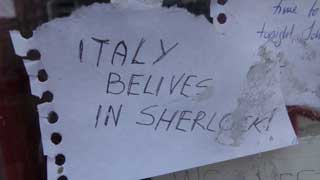 Sticker reading Italy believes in Sherlock Holmes.