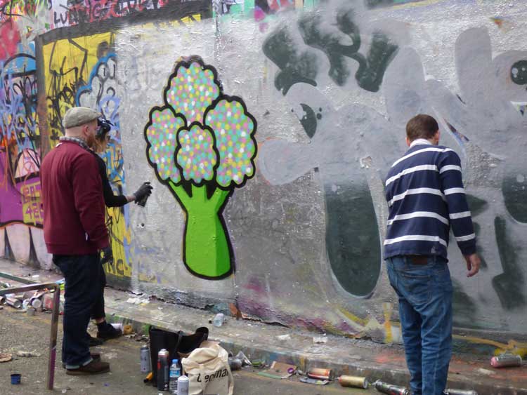 Artists at work in the Leake Street Tunnel.