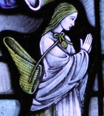 Little Dorrit's kneeling image on the window at St George's Church.