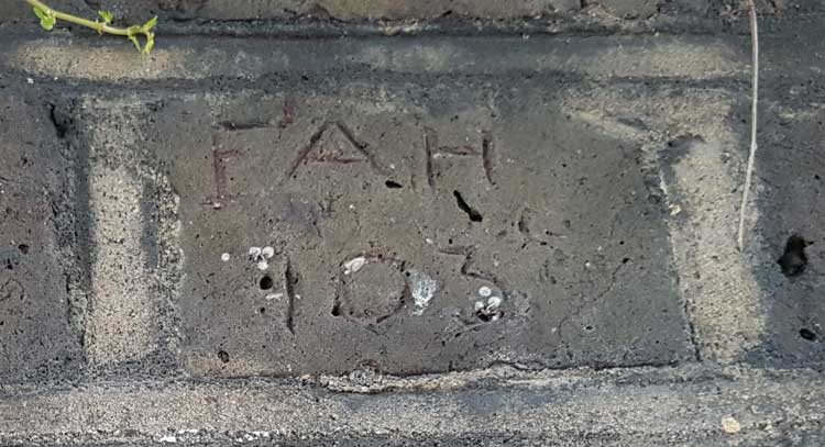 FAH 103 carved onto one of the bricks.