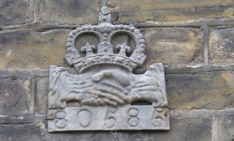 An insurance mark on one of the houses in Roupell Street