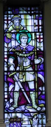 The stained glass window inside the church of St George the Martyr.