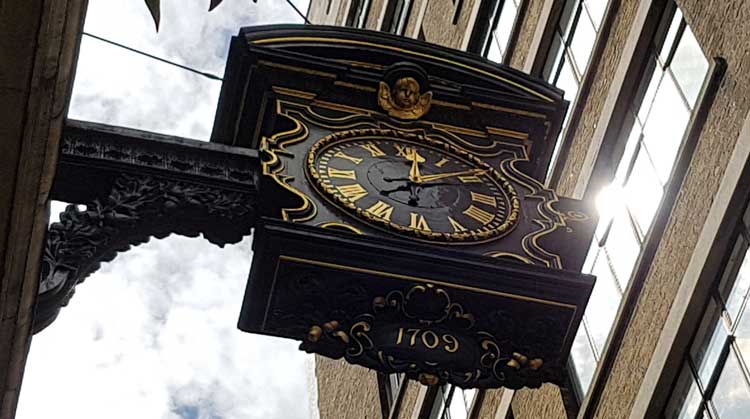 The clock on the tower of St Magnus The Martyr with the year 1709 beneath it.