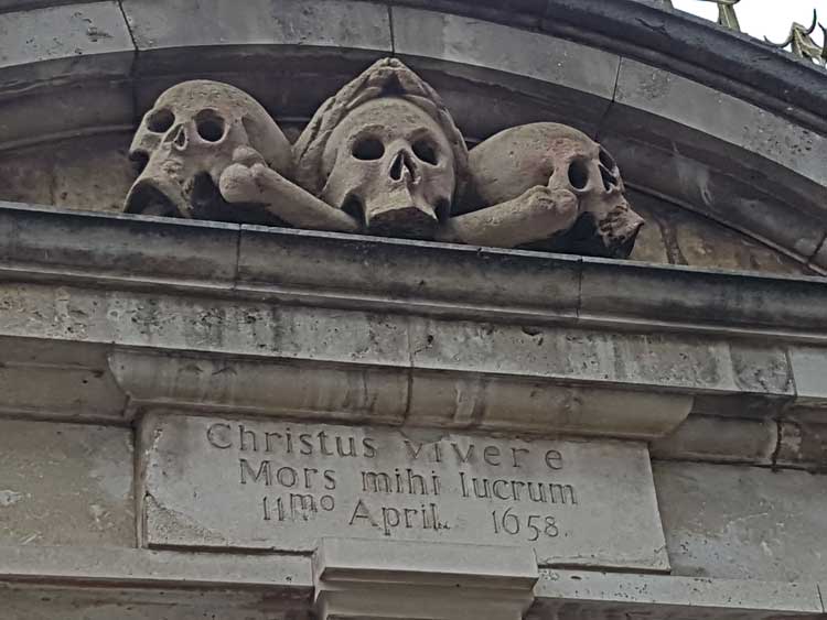 The skulls over the gate of St Olave's Hart Street.